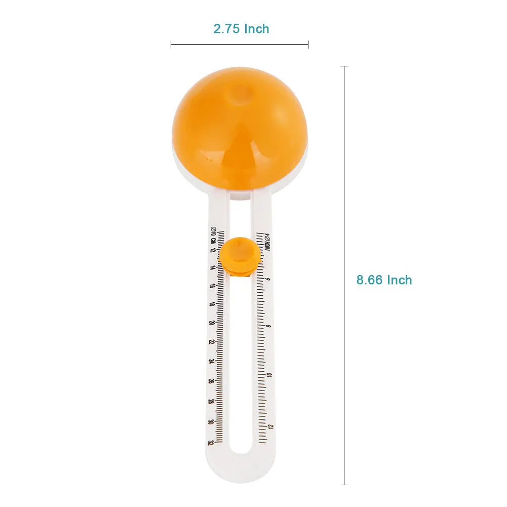 A yellow circular paper cutter with an interchangeable blade and a measuring scale.