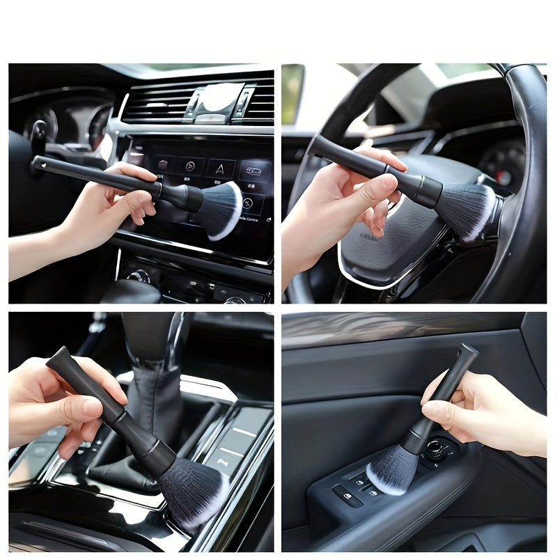 Hands cleaning the interior of a car using a soft bristle detailing brush.