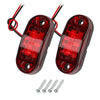 A pair of red LED side marker clearance lights for trucks, trailers, and caravans with wiring and mounting screws.