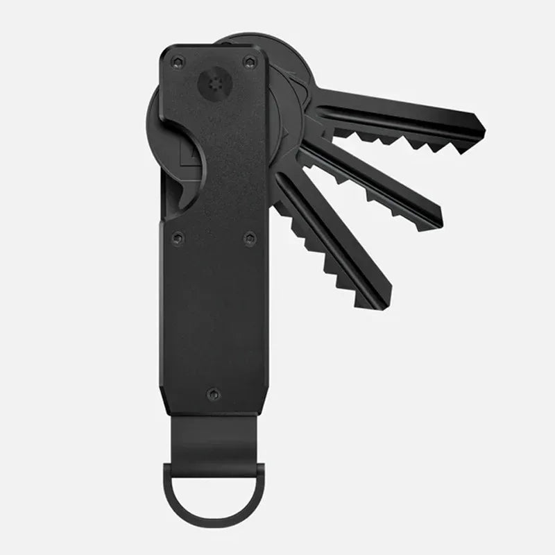 A black minimalist aluminum key organizer with a handle and multiple slots for holding keys.