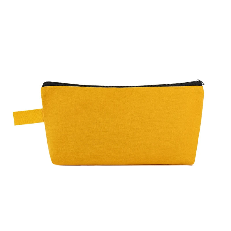 A bright yellow canvas zipper pouch for cosmetics, stationery, and travel.