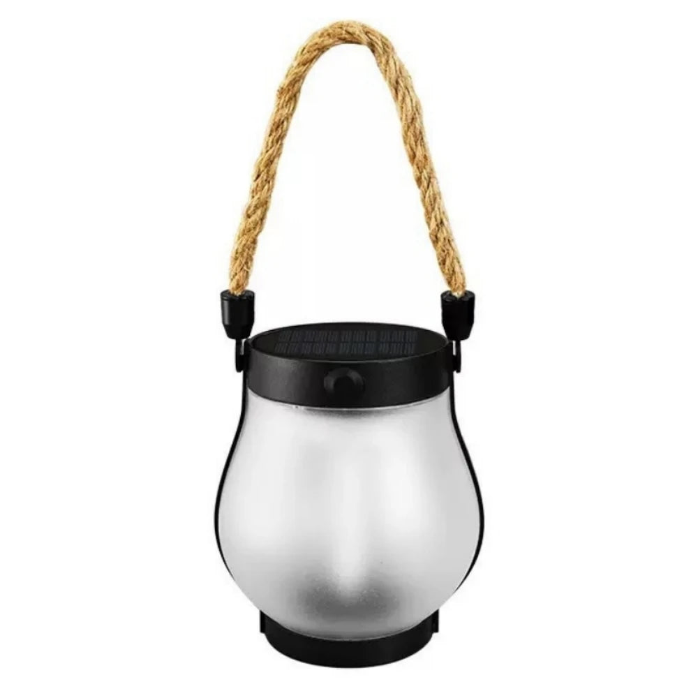 Lampe à flamme solaire argentée avec poignée à corde.