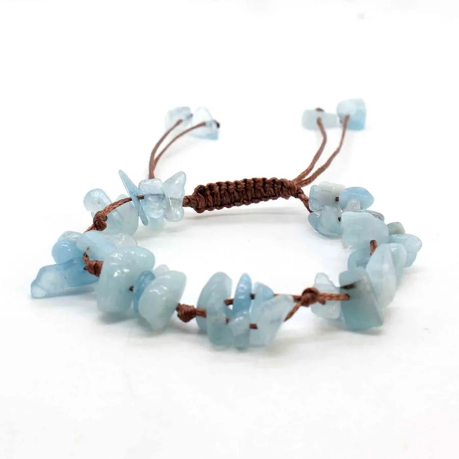 A set of light blue crystal chip stone braided bracelets made with natural quartz and amethyst.