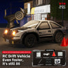 A black RC drift vehicle is shown with accessories and instructions on a dark surface.