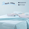 A light blue ice silk cooling blanket is shown folded on a bed with a pillow and a rolled-up section.