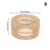 A woven paper rope pendant lampshade in a natural beige color.