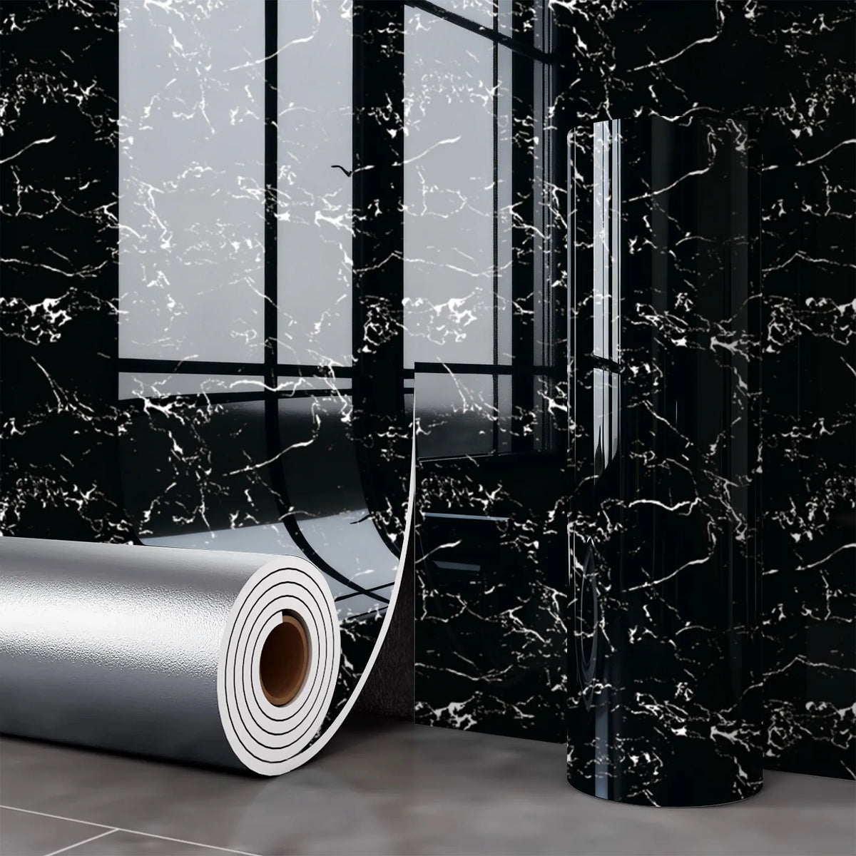 Roll of self-adhesive marble wall sticker for kitchen and bathroom displayed against a black marble background.