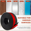 Roll of black and red self-adhesive door draft stopper for soundproofing and insulation