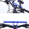 A close-up view of an aluminum alloy bicycle handlebar extender mount installed on a bike's stem.