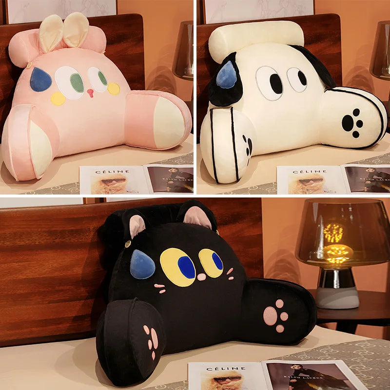 A collection of adorable cat and dog plush backrest cushions in pink, white, and black.