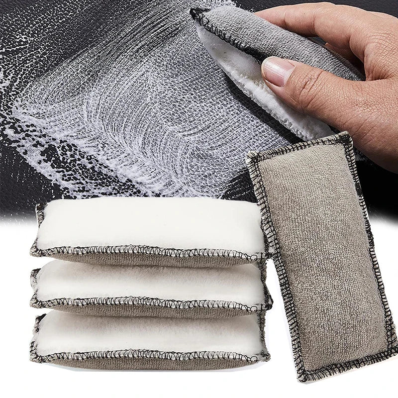 A set of dual-sided cleaning sponges used for car interior cleaning, showing a textured surface and a folded sponge.