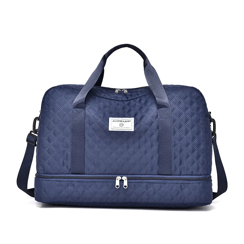 A navy blue Zuomnni lightweight nylon travel duffle bag with quilted texture.