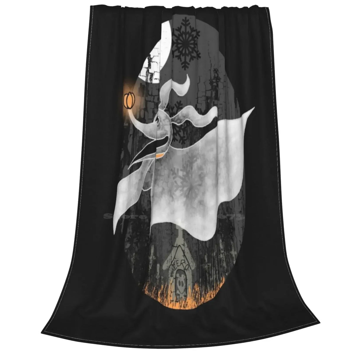 A black blanket featuring a stylized white silhouette of a figure with flowing hair and a snowflake design.