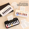 A set of three DLIGA MUSIC electronic keyboards and piano performers with colorful lights and sheet music.