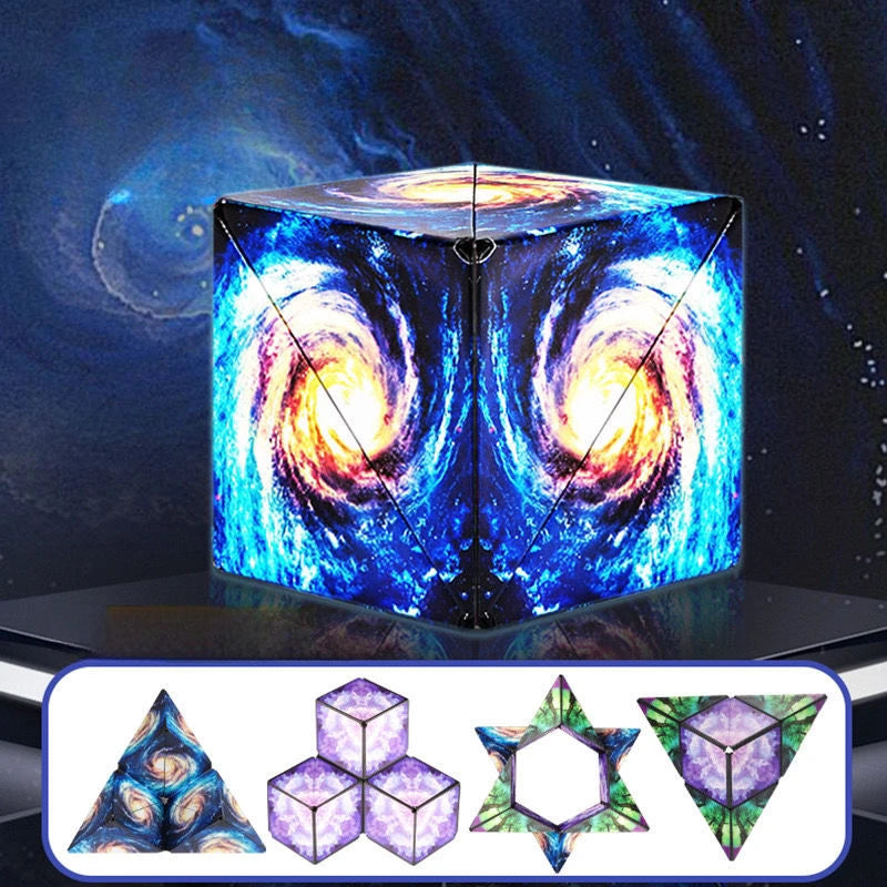 A translucent cube fidget toy with a swirling galaxy design and various geometric shapes.