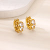 Boucles d'oreilles créoles en zircon cubique ton or