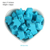 A pile of light blue silicone crown star heart beads for DIY jewelry making