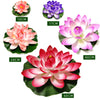 A collection of pink and purple lotus flowers of various sizes displayed on green leaves.