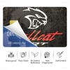 A credit card skin cover featuring a stylized black and white dragon head design on a dark background.