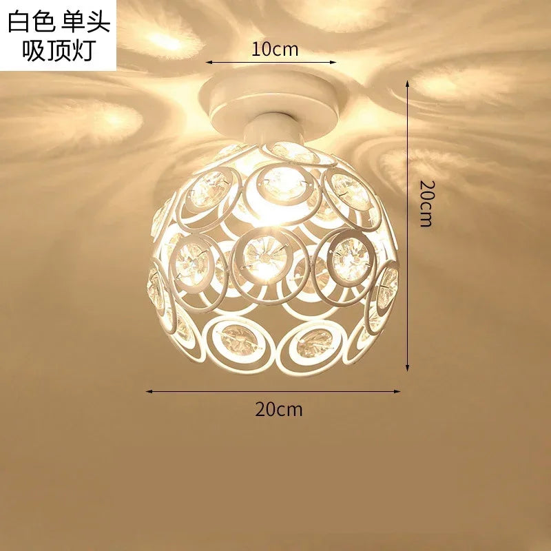 A white crystal single-head ceiling lamp with a metal frame, shown hanging from the ceiling.