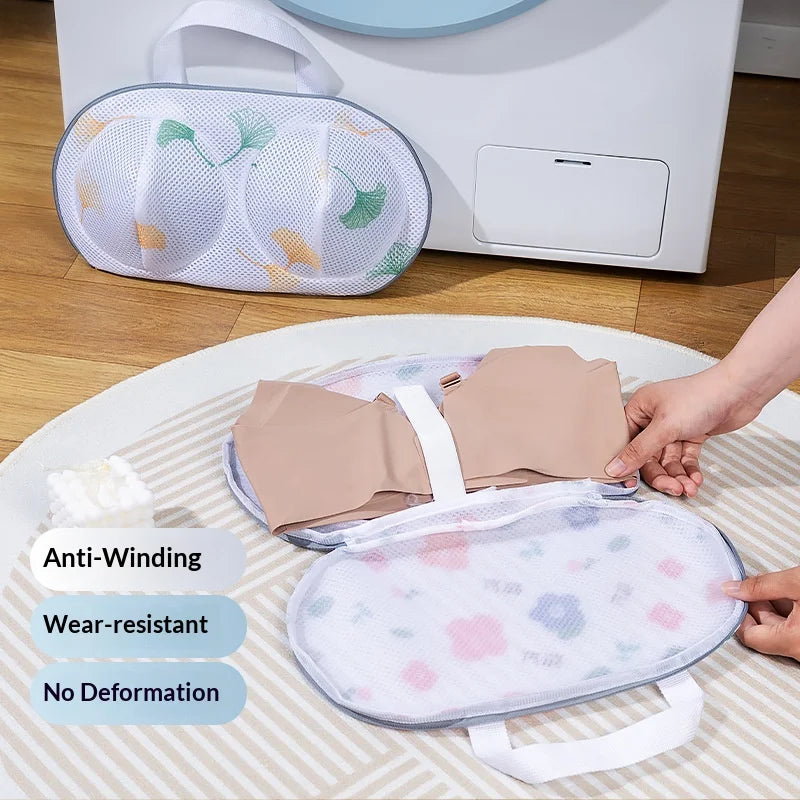 A beige mesh laundry bag is shown on a white surface, demonstrating anti-winding and wear-resistant features.