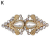 Vintage gold and diamond swirl clip for securing cardigans and shawls