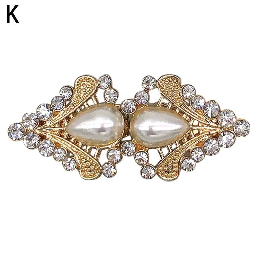 Vintage gold and diamond swirl clip for securing cardigans and shawls