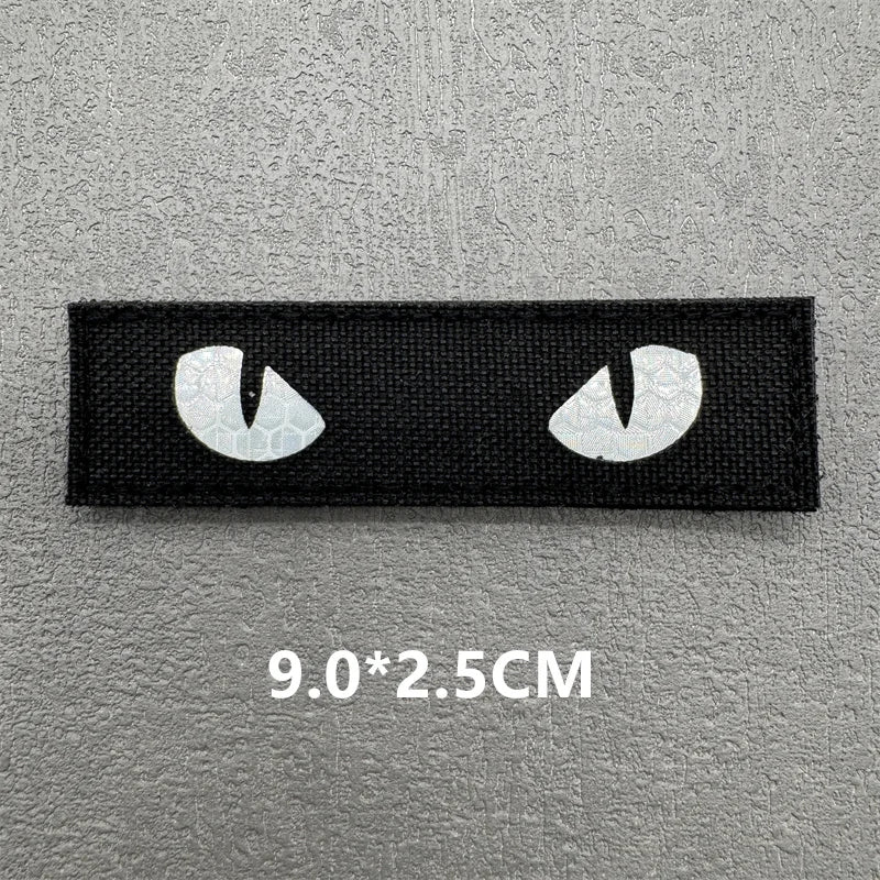 Black tactical IR reflective patches with hook and loop backing