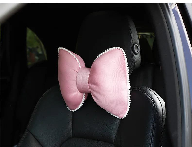 Pink silky bow car headrest pillow with white trim and waist cushion set