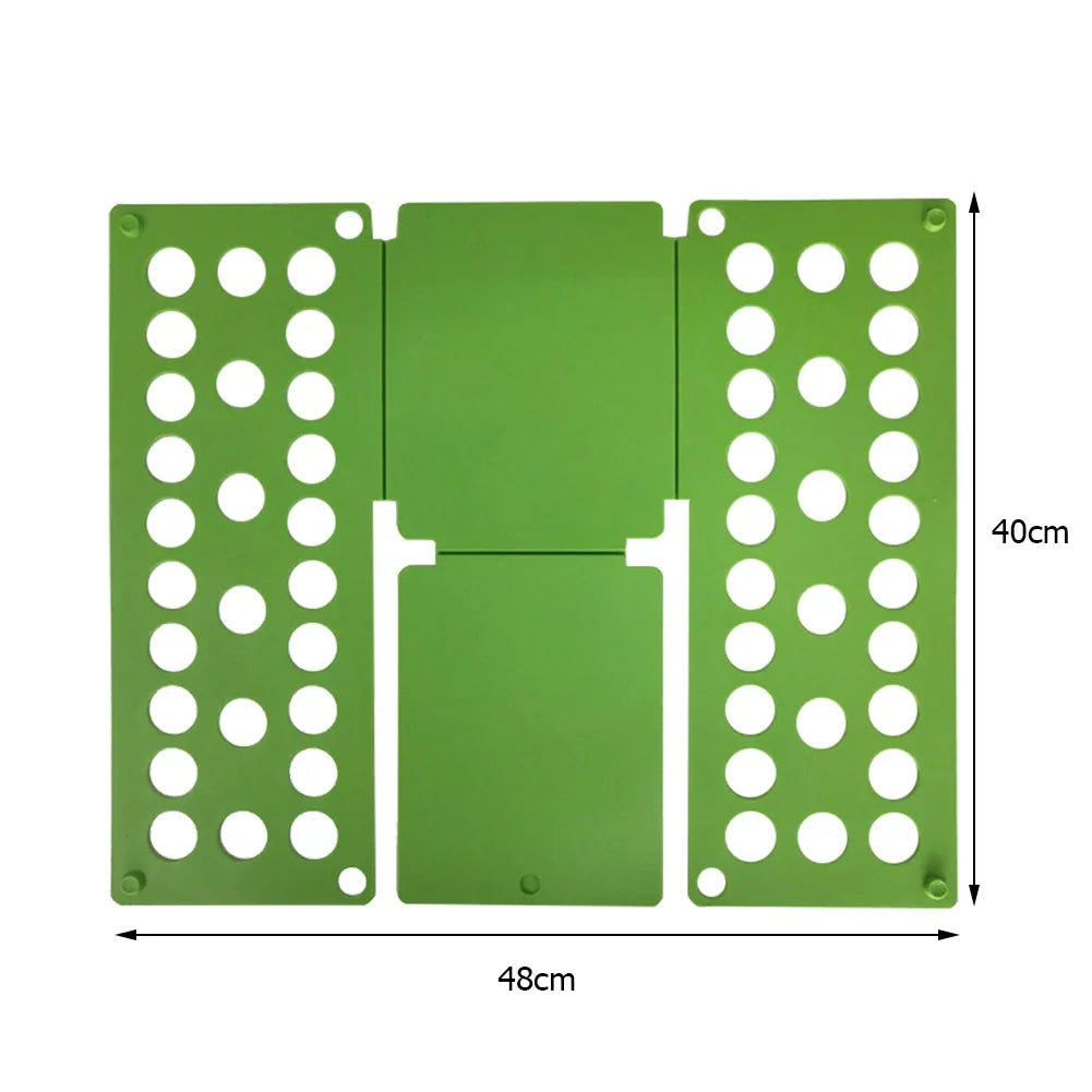 A green portable clothes folding board with multiple holes for hanging laundry.