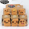 A collection of Fuggler nuggets plush toys in various shades of brown and gold packaging.