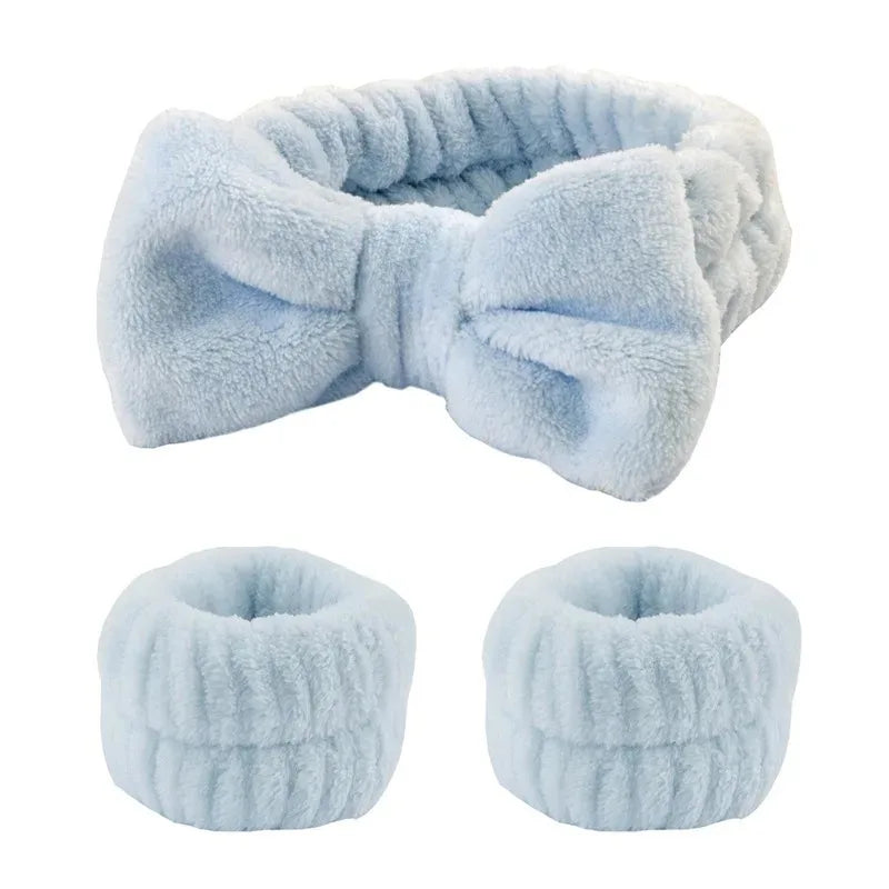 Light blue microfiber wrist washing bands or face-saving cuffs with a bow detail