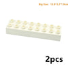 A white rectangular block set with multiple round holes, showing 2 pieces.