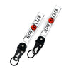 A white nylon keychain with black lettering and a steel clip, featuring the text Slow Car Club.