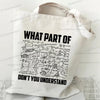 A white canvas tote bag with black text that reads WHAT PART OF DON'T YOU UNDERSTAND