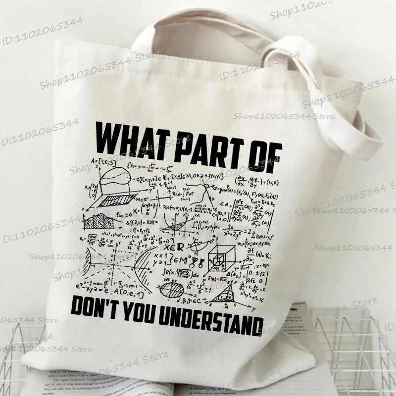A white canvas tote bag with black text that reads WHAT PART OF DON'T YOU UNDERSTAND