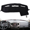 Black custom-fit dash cover for a Dodge Ram truck interior