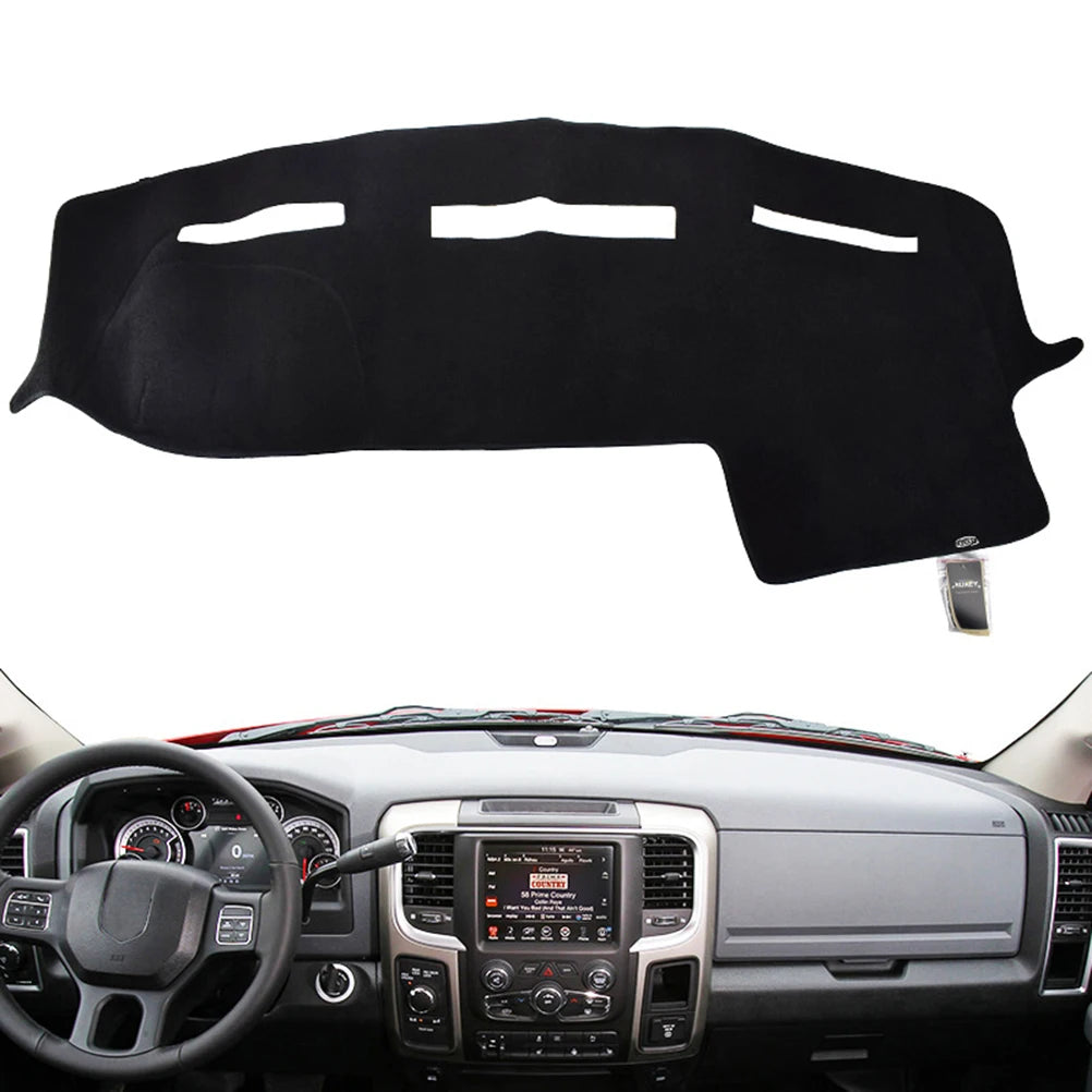 Black custom-fit dash cover for a Dodge Ram truck interior