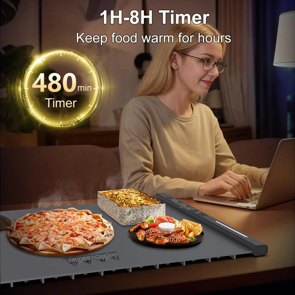 A woman is using a foldable electric food warming tray with a timer to keep food warm for hours.