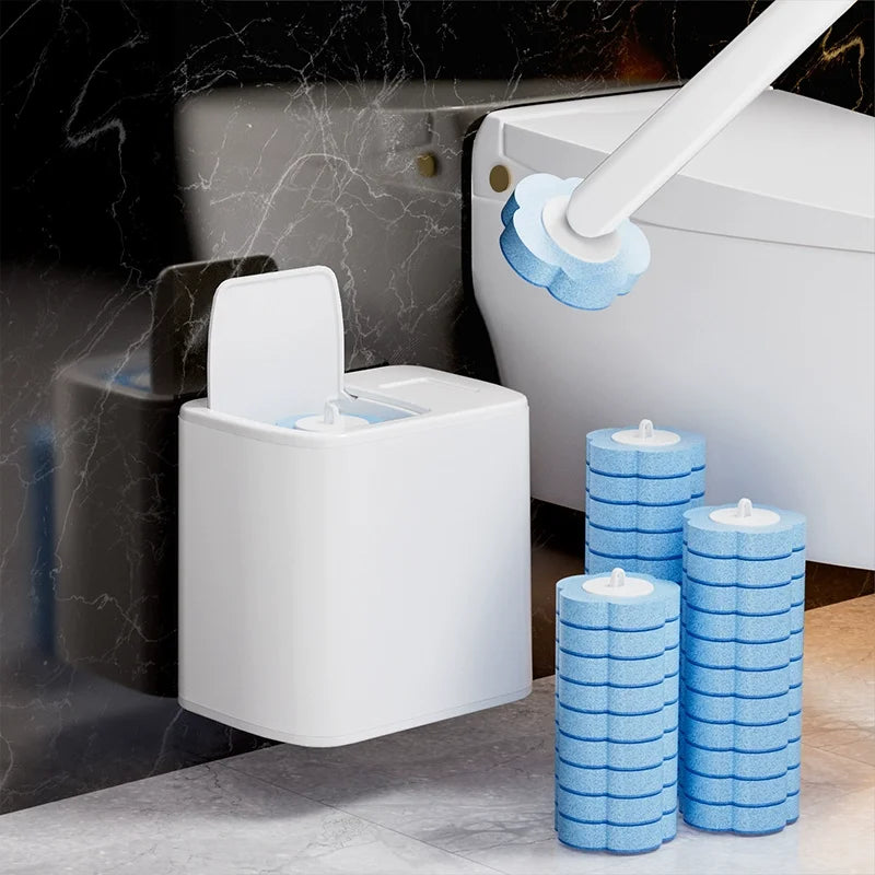 A white disposable toilet cleaning brush kit with an auto-open lid is shown next to a white toilet tank.