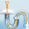 An orange flexible drain cleaning tool is shown being used to clear a curved plastic drain pipe.