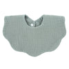 A light sage green soft cotton baby bib in a bandana style with a rounded neckline.