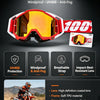 A pair of red and black motocross goggles with yellow lenses shown against a dark background.