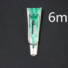 A close-up view of a stainless steel bias tape maker, measuring 6mm, against a dark background.