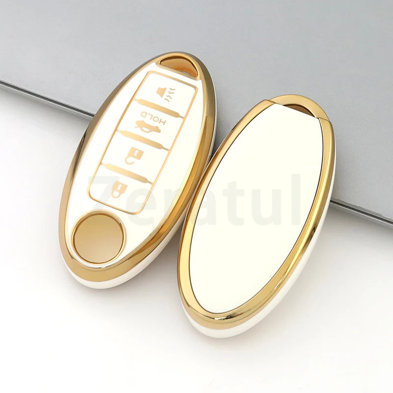 A gold and white TPU car key case cover for Nissan and Infiniti models shown against a gray background.