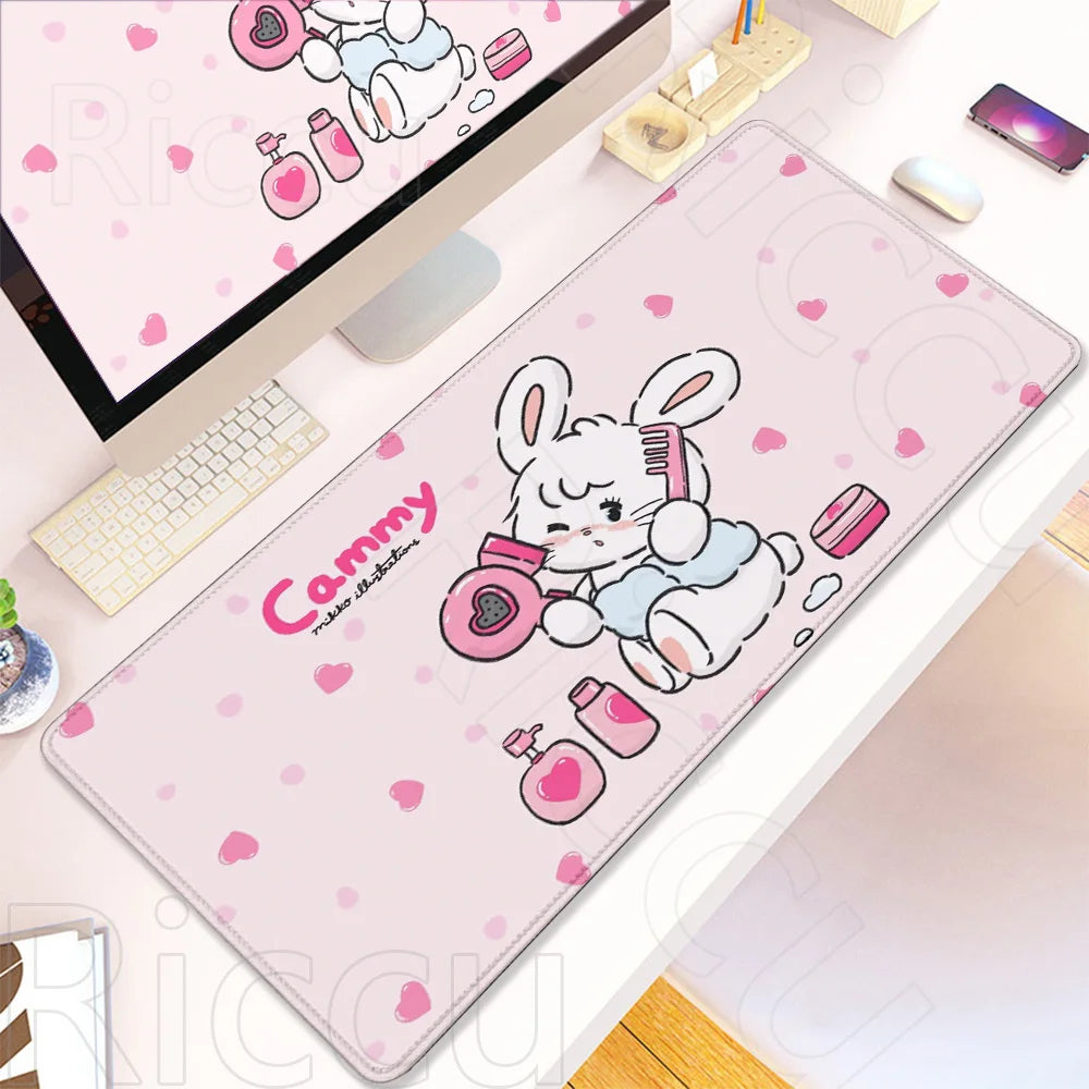 Pink kawaii cartoon desk mat featuring a white rabbit design for gaming