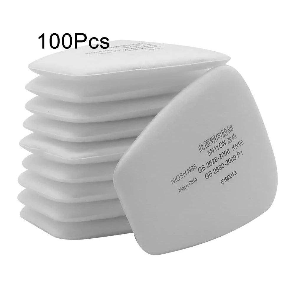 A stack of 100 replacement dust filter pads for respirators, white in color.