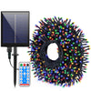 A solar powered LED string light set featuring a solar panel and a circular string of multicolored lights.