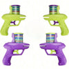 A set of four foam disc launcher toys in lime green and purple colors.