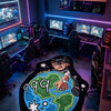 A cartoon area rug featuring Juice WRLD 999 for a gaming room setup with multiple monitors and lighting.